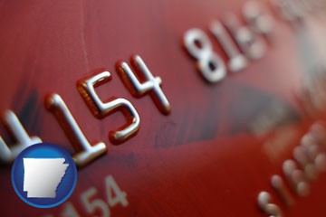 a credit card macro photo - with Arkansas icon