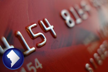 a credit card macro photo - with Washington, DC icon