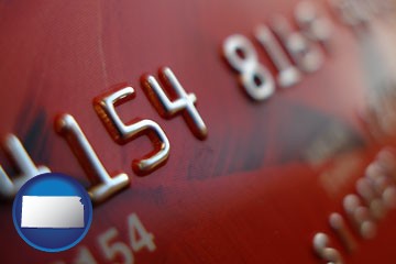 a credit card macro photo - with Kansas icon