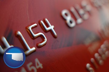 a credit card macro photo - with Oklahoma icon